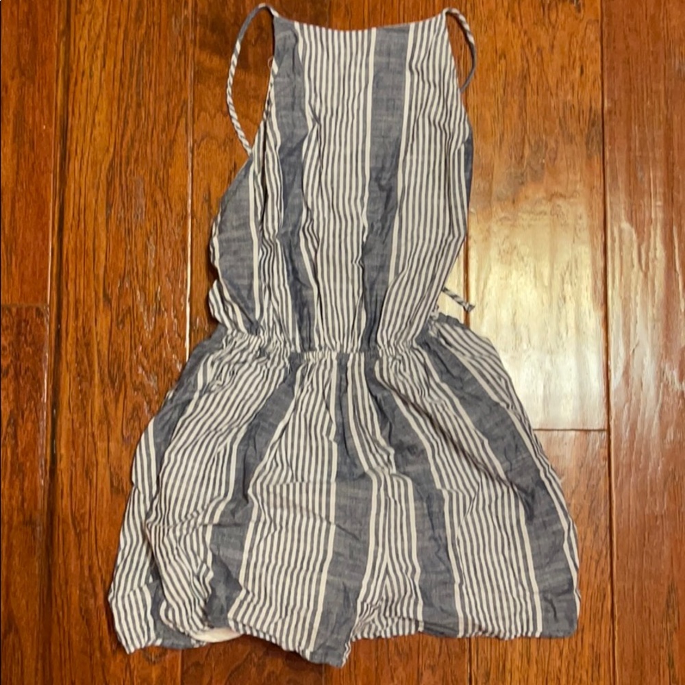 Short one piece with open back and ties in back